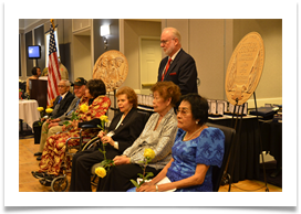 Muster Roll Call with Veterans and widows and Col. Ed Ramsey Jr. behind Raqui